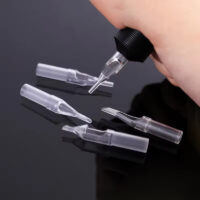 Sterile disposable tattoo tips – clear, individually packed single-use tattoo tube tips for professional tattoo artists and studios.